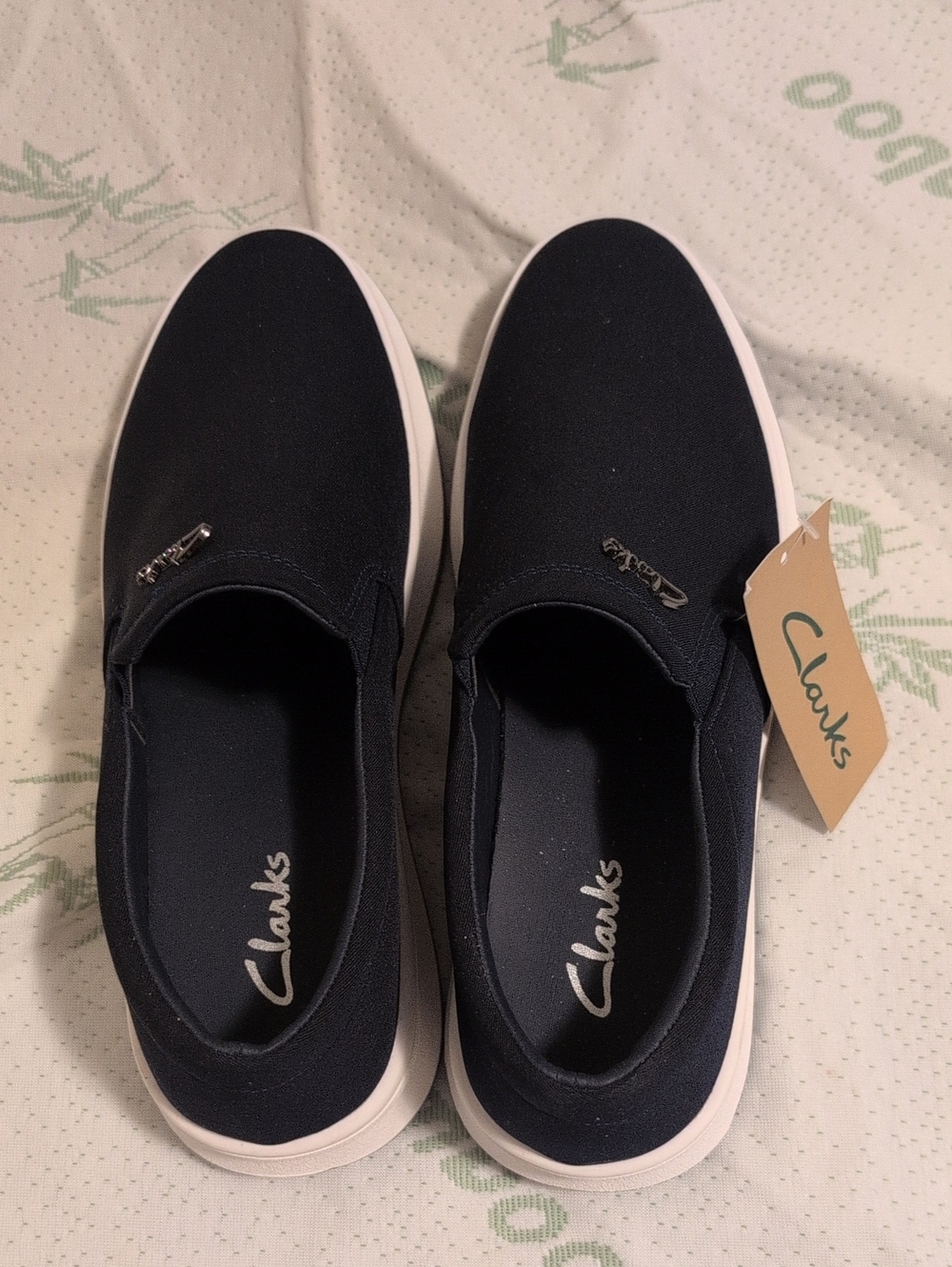 Clarks Navy Slip-On Casual Sneakers with White Sole